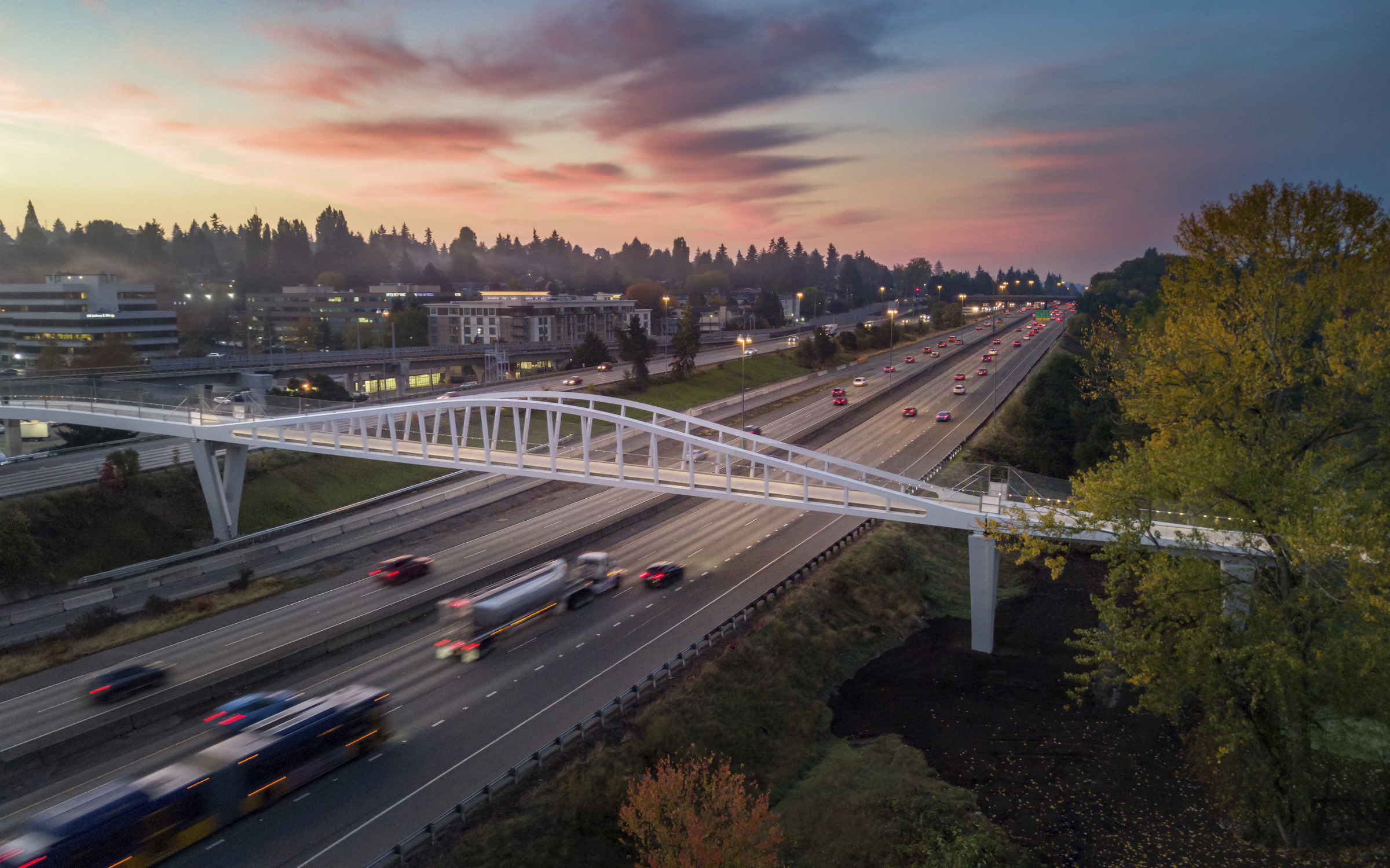 The John Lewis Memorial Bridge in Northgate, WA, just outside Seattle, gives pedestrians and cyclists access between a light rail station, a community college, and a natural preserve across Interstate 5. 