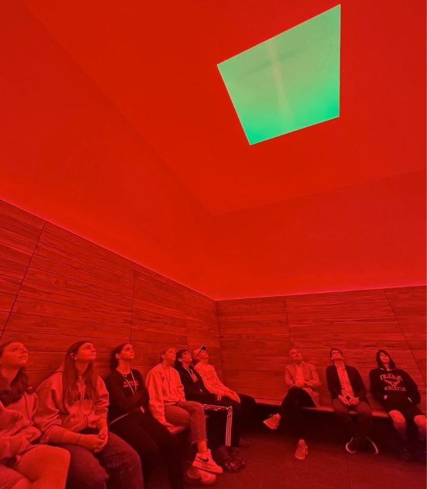 James Turrell's Skyspace installation at Friends Seminary School in New York, showing red and green light effects